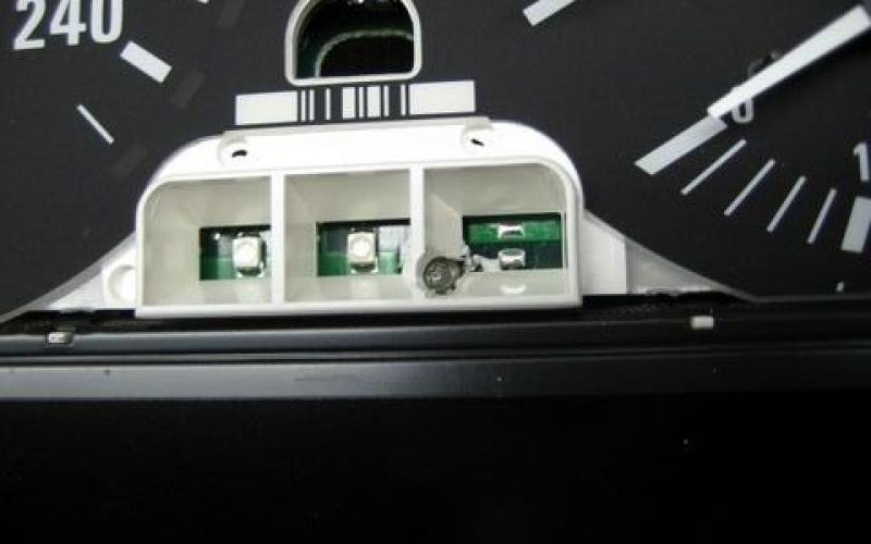 3rd hole is between the LEDS