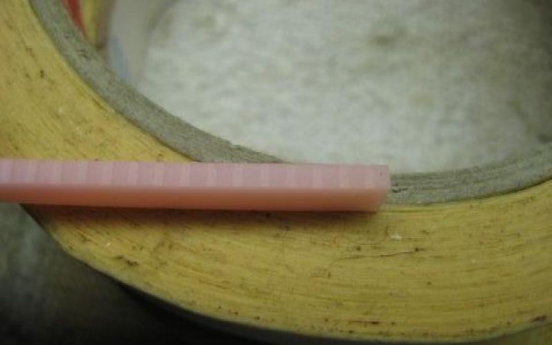 If you look at the strip you can see the imprint in the rubber, flip it around and put it back.