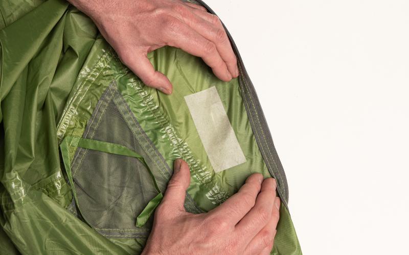 Securing the tear with 'repair tape'