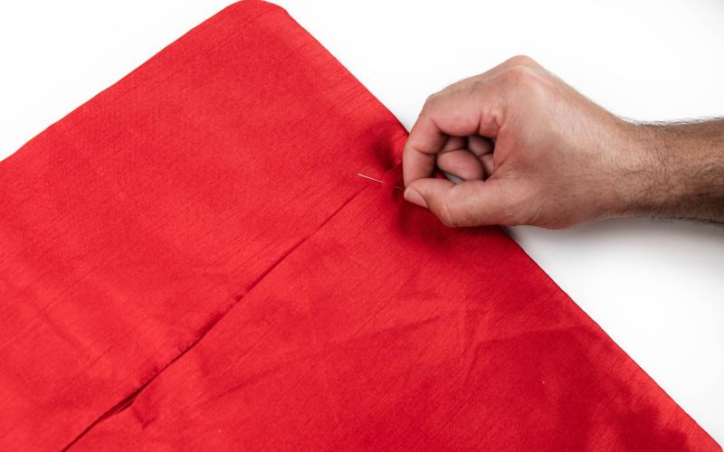 Coser los extremos de la cremallera